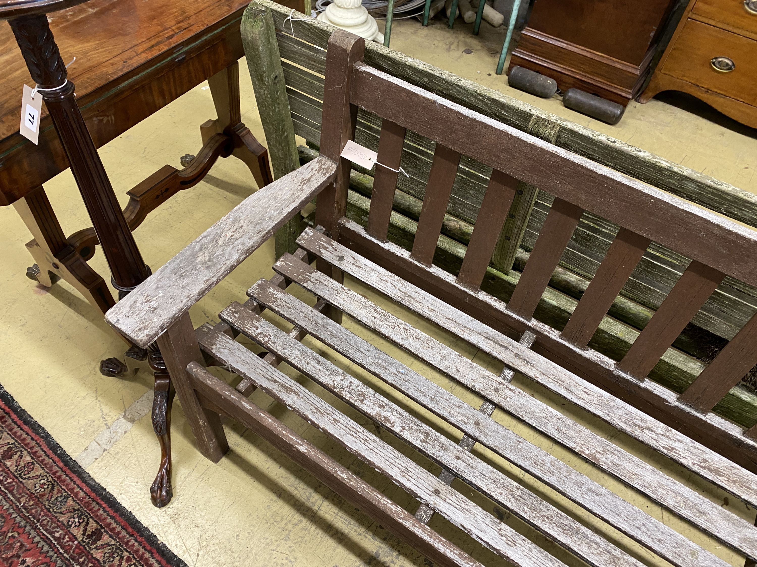 A part painted weathered teak garden bench, length 158cm, depth 56cm, height 84cm